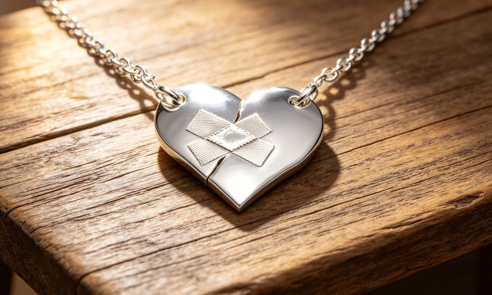 Steling Silver Wounded Heart Pendant Necklace