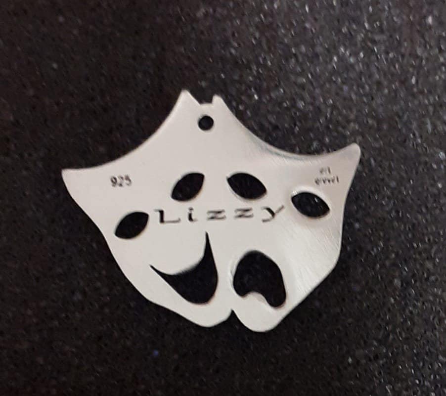 Colgante de máscaras de teatro de plata de ley